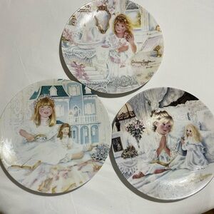 Set of 3 Edwin Knowles little girl collector plates.